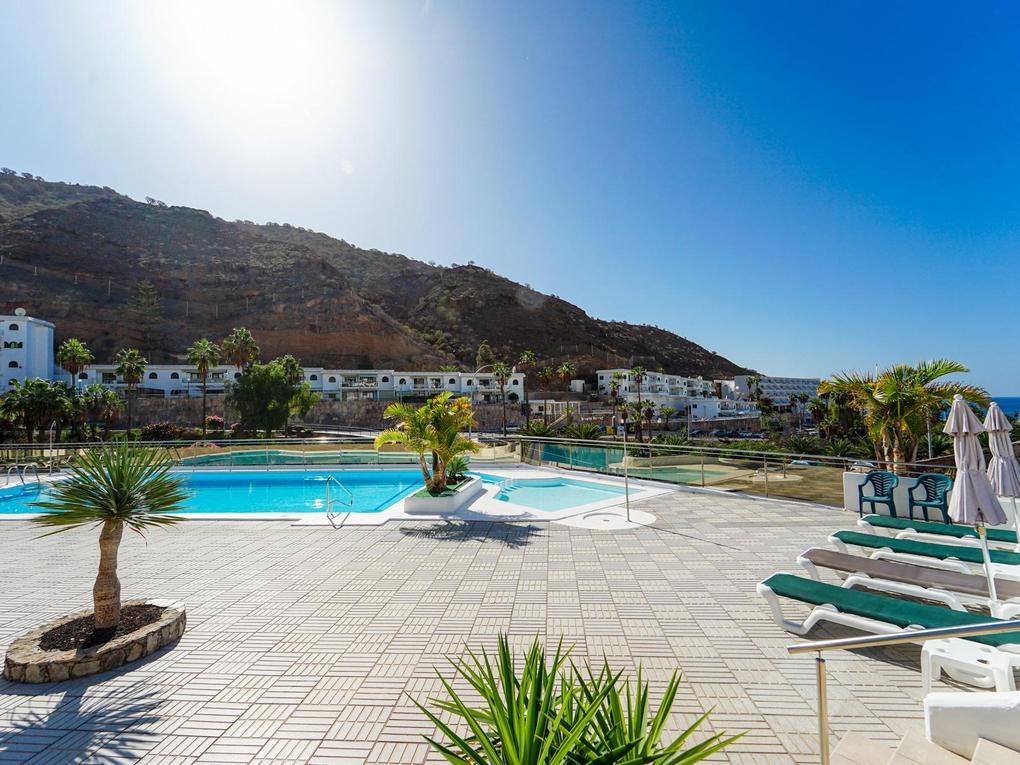 Piscina : Apartamento  en venta en Aquacanis,  Puerto Rico, Barranco Agua La Perra, Gran Canaria con vistas al mar : Ref 05866-CA