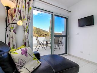 Woonkamer : Appartement te koop in Malibu,  Puerto Rico, Gran Canaria   : Ref 05546-CA