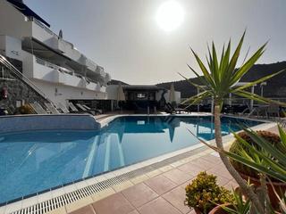 Pool : Lägenhet  till salu  i Vista Puerto,  Puerto Rico, Barranco Agua La Perra, Gran Canaria med havsutsikt : Ref 05571-CA