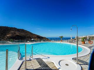 Pool : Lägenhet  till salu  i Guanabara Park,  Puerto Rico, Barranco Agua La Perra, Gran Canaria med havsutsikt : Ref 05652-CA
