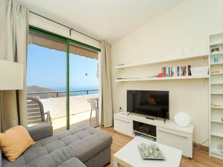 Woonkamer : Appartement te koop in Monte Paraiso,  Puerto Rico, Gran Canaria  met zeezicht : Ref 05745-CA