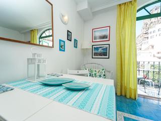 Woonkamer : Appartement  te koop in Puerto de Mogan,  Mogán, Puerto y Playa de Mogán, Gran Canaria met zeezicht : Ref 05858-CA