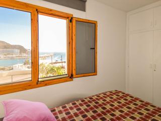 Slaapkamer : Appartement , direct aan het water te koop in  Puerto Rico, Gran Canaria met zeezicht : Ref S0141