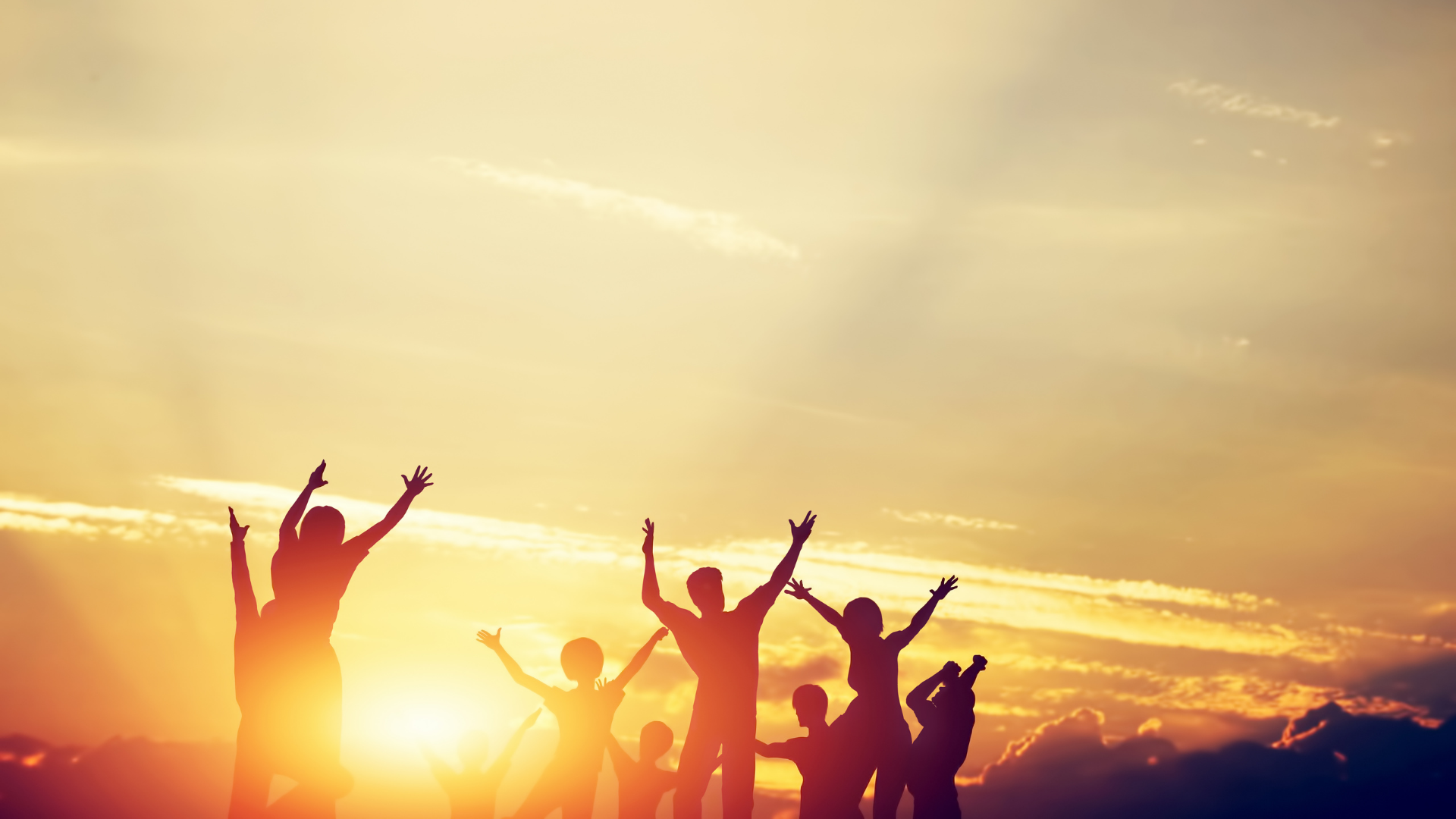 People raising hands together