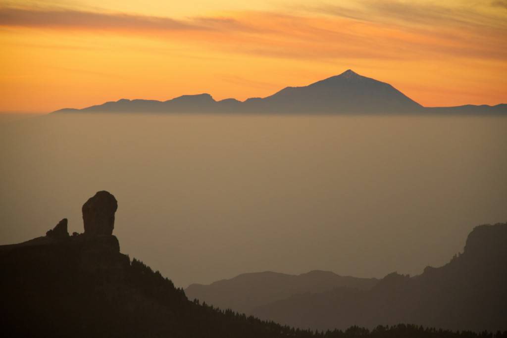 The view west from Pico de las Nieves in Gran Canaria with Roque Nublo and Teide volcano.